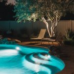 a-backyard-scene-with-an-in-ground-pool-at-night-t-AgK_OZM5R9SGM-jl09pozg-s-VJI_HFQVCEMW1LUNb1_g-cover